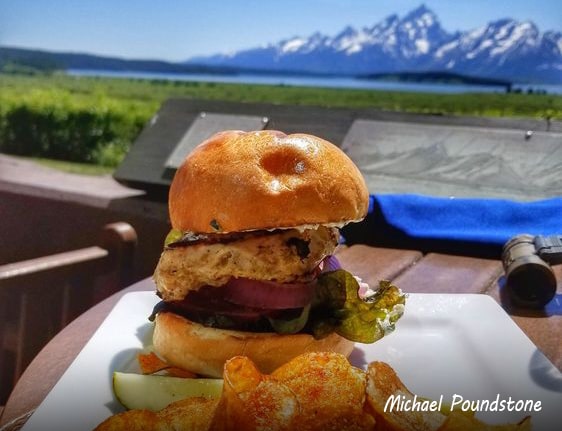 Food on Blue Heron Lounge's Deck at Jackson Lake Lodge with Grand Teton in the background