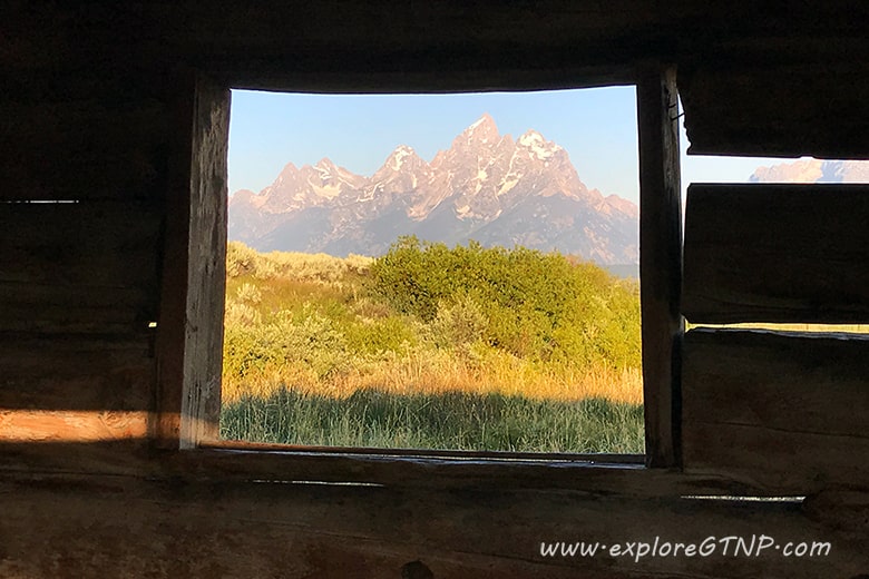 Explore Grand Teton National Park Grand Teton through Cunningham Cabin window