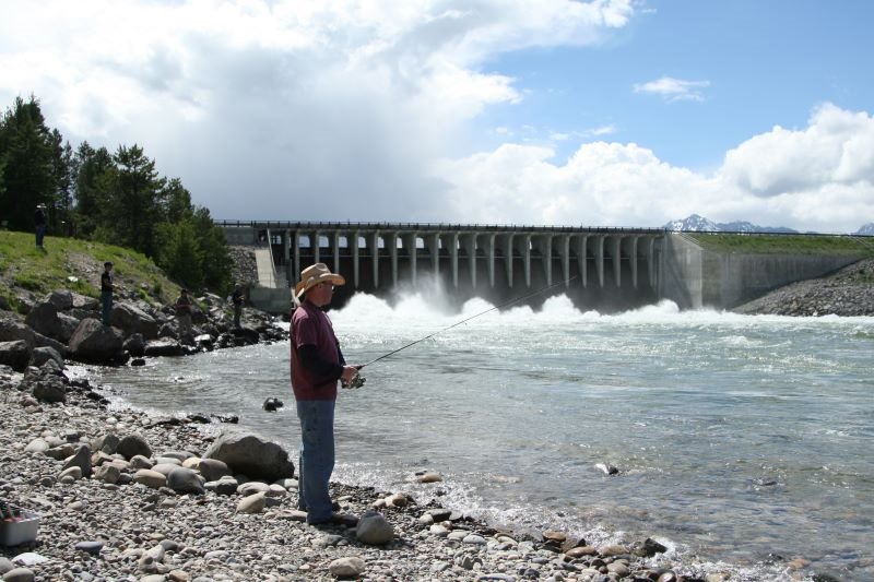 Explore GTNP Man fishing at Jackson Lake Dam