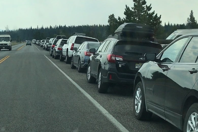 Overflow of cars at the Taggart Lake Trailhead Parking Lot in the afternoon