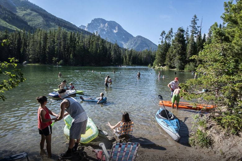 People Swimming at String Lake in Grand Teton National Park