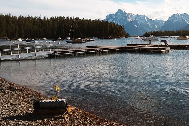 Leek's Marina with boats and Grand Tetons in the background