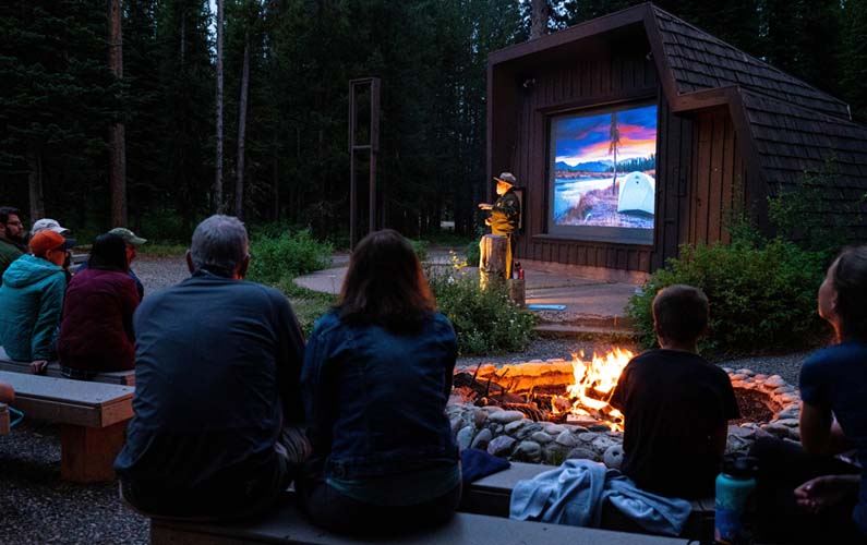 People listening to a Park Ranger Colter Bay Amphitheater in Grand Teton National Park