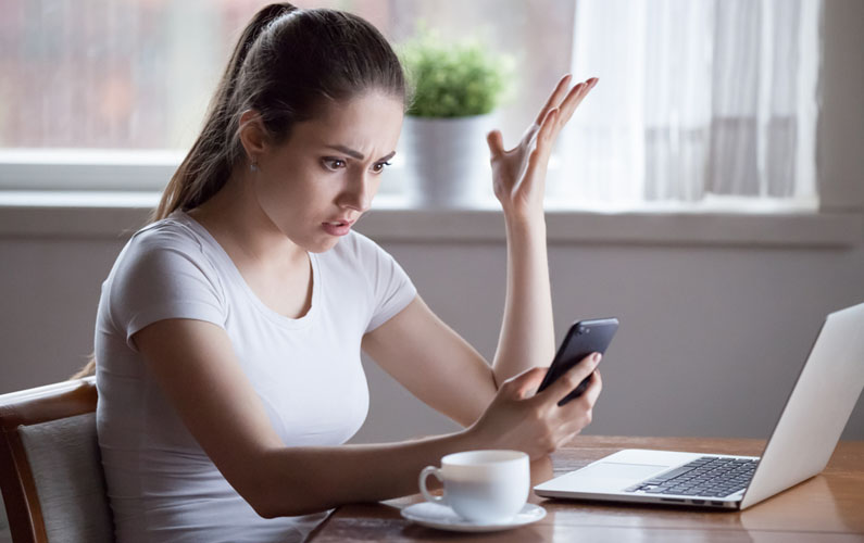 Woman frustrated with phone