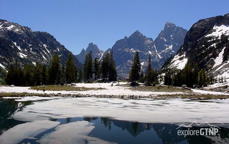 grand-teton-national-park-lake-solitude-with-ice-and-snow